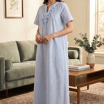 Women's long striped kaftan in light blue with a seriscoir pattern, elegant embroidery on the chest, and a V-neck. 26-20-A-1